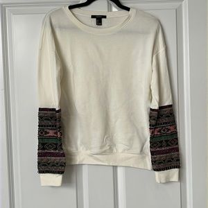 Cream sweatshirt with colored and beaded detail